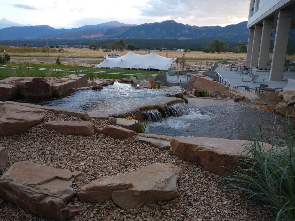 ENT-FCU-Stretch-Tent-pitch1 Stretch tent with Ent FCU water feature
