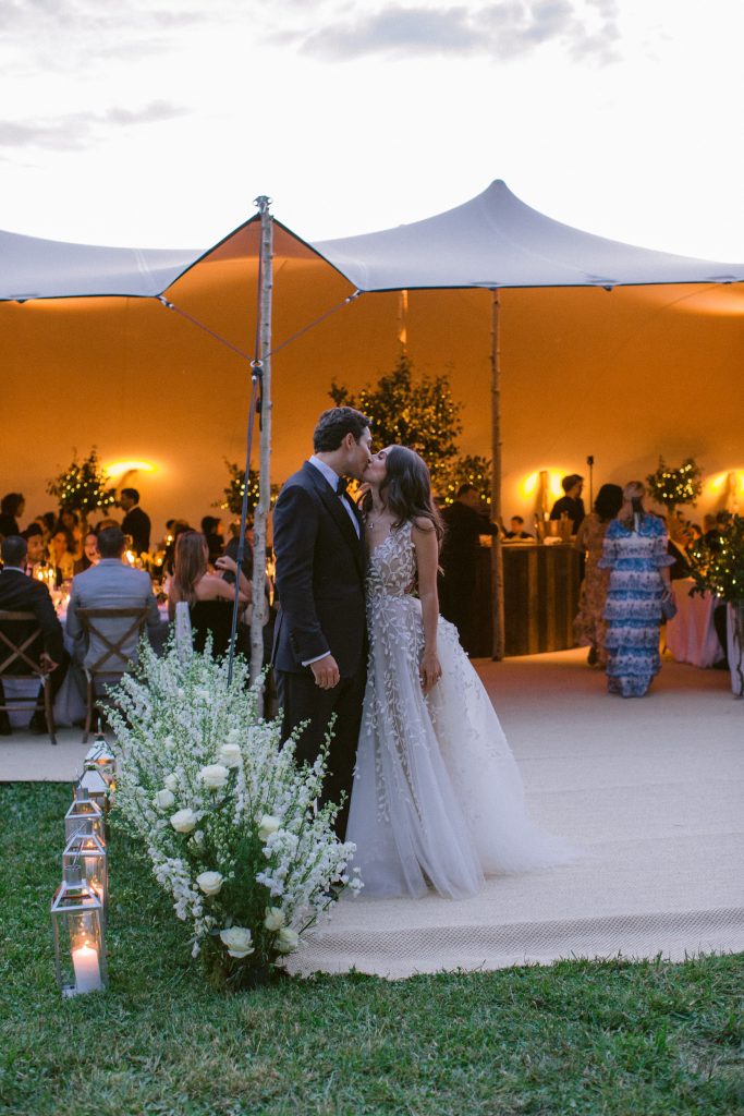 Catherine Meadcatherine@catherinemead.com Aspen Wedding Bride and Groom under stretch tent
