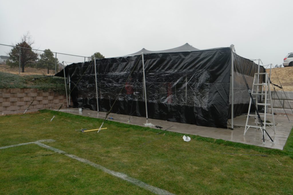 SwitchbacksFC Business Club Tent Install Switchback FC tent and sidwalls