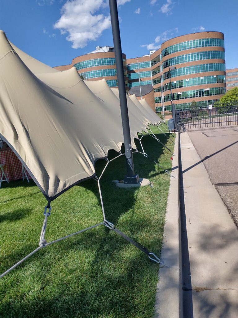 USOPC Tent pitch edge US Olympic Center stretch Tent Pitch with Children's Hospital in the BackGround